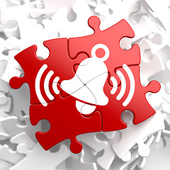 Image showing Ringing White Bell Icon on Red Puzzle.