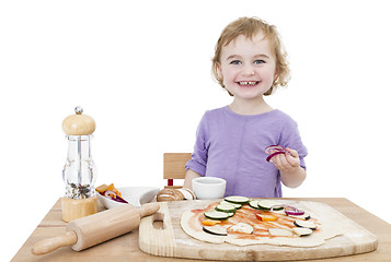 Image showing happy child making pizza