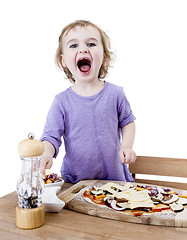 Image showing screaming child making fresh pizza