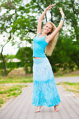 Image showing Barefooted blond woman