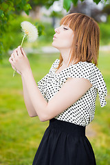 Image showing Young redhead woman