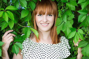 Image showing Smiling redhead woman