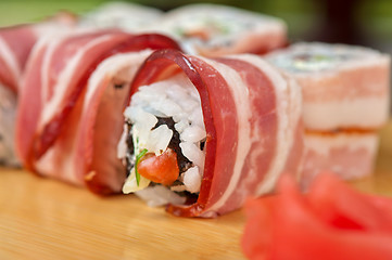 Image showing Sushi roll with bacon