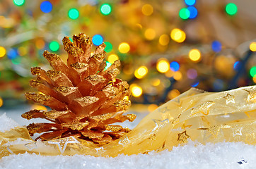 Image showing Two golden pine cone