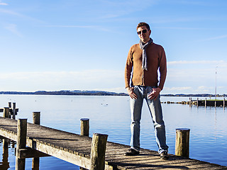 Image showing Man on landing stage