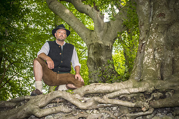 Image showing Sitting traditional Bavarian man