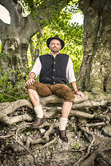 Image showing Sitting traditional Bavarian man