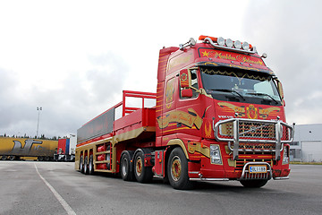 Image showing Red Volvo FH with Special Trailer