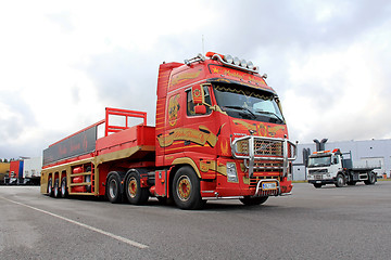 Image showing Red Volvo FH with Special Trailer