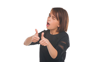 Image showing Teenage girl showing thumbs up