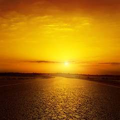 Image showing sunset over asphalt road