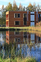 Image showing Modern buildings on the lake