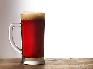 Image showing Frosty mug of dark beer