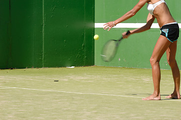 Image showing Woman is serving