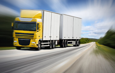 Image showing 	truck driving on country-road