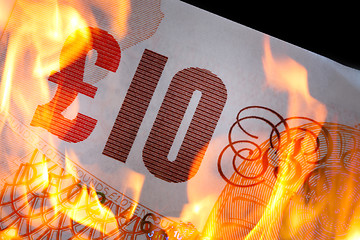 Image showing £10  burning