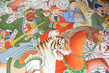 Image showing Buddhist art on the walls