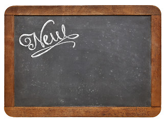 Image showing new word on blackboard