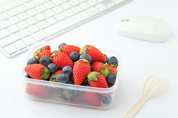 Image showing Healthy lunch box on working desk