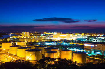 Image showing Oil tanks plant during sunset