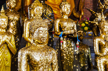 Image showing Golden foil on buddha statue