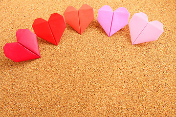 Image showing Origami colorful heart on corkboard