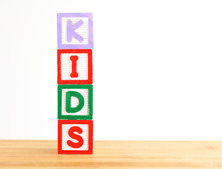 Image showing Alphabet building blocks that spelling the word kids