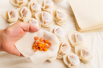 Image showing Wrapping of Chinese dumpling