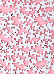 Image showing White puzzle on pink background