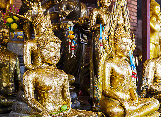 Image showing Golden foil on buddha statue