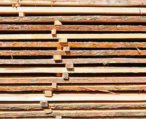 Image showing Stacked lumber background