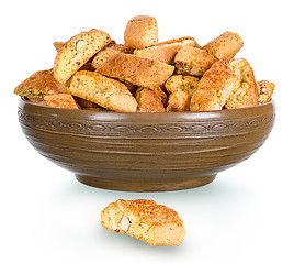 Image showing hard, dry biscuit with almonds in a rural clay plate