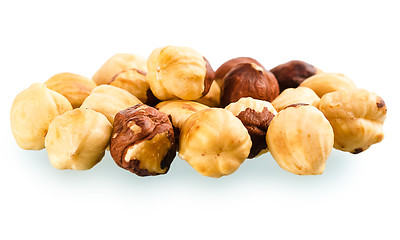 Image showing A pile of shell-less hazelnuts, isolated on white background