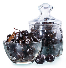 Image showing Dried black olives in a glass