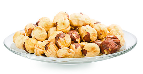 Image showing A pile of shell-less hazelnuts, isolated on white background