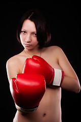 Image showing beautiful nude girl with boxing gloves