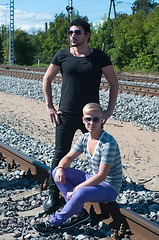 Image showing Two men on train tracks