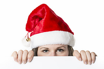 Image showing Santa Woman behind board