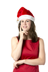 Image showing Santa Woman with finger at cheek