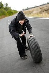 Image showing Man With Wheel