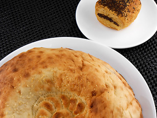 Image showing cake and bread on white plate