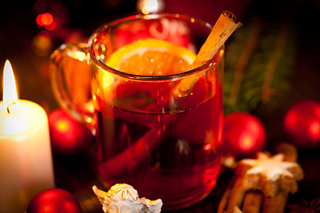 Image showing hot tasty spicy mulled red wine with orange and cinnamon christmas 