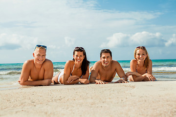 Image showing young happy friends havin fun on the beach