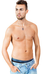 Image showing young attractive man in jeans and naked body isolated