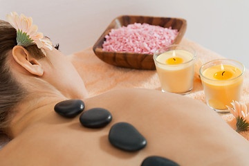 Image showing attractive healthy caucasian woman hot stone massage wellness 