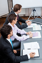 Image showing business team in office meeting presentation conference