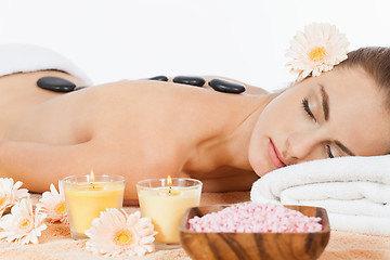 Image showing attractive healthy caucasian woman hot stone massage wellness 