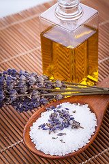 Image showing lavender massage oil and bath salt aroma therapy wellness