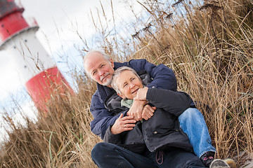 Image showing happy mature couple relaxing baltic sea dunes 