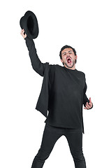 Image showing Man with hat in hand yelling